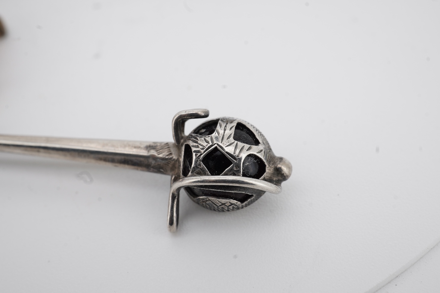 An early to mid 20th century Norwegian 925S and two colour enamelled, brooch, by Ole Nicolai Olberg, depicting three seagulls, 51mm, together with a silver ballerina brooch by D H Phillips Ltd, Birmingham, 1947, a sterli